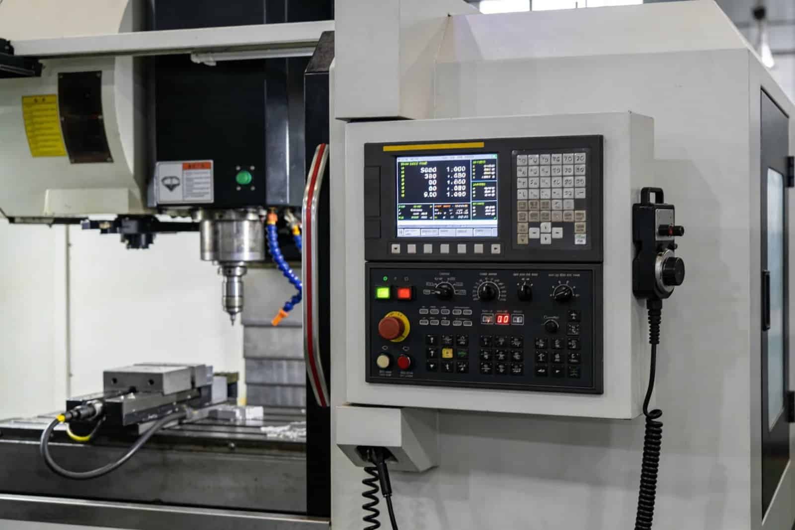 A CNC machine controller showing speeds and feeds