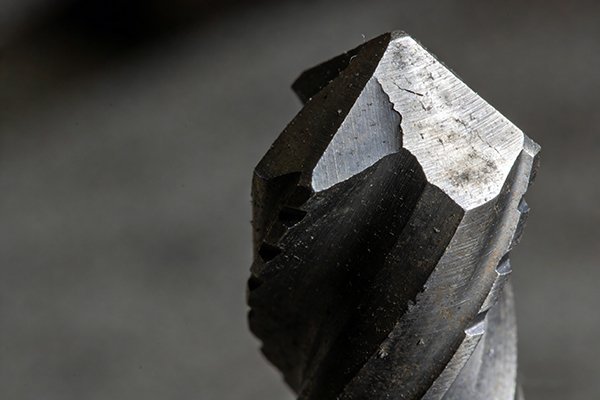 Images showing different types of drill wear patterns like flank wear and chipping
