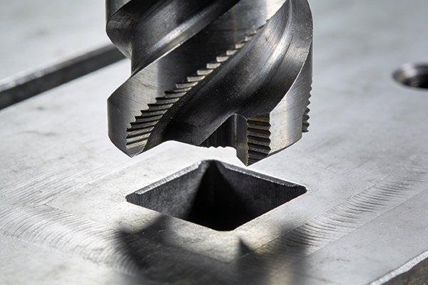 A large face mill unable to fit into a small pocket on a workpiece.