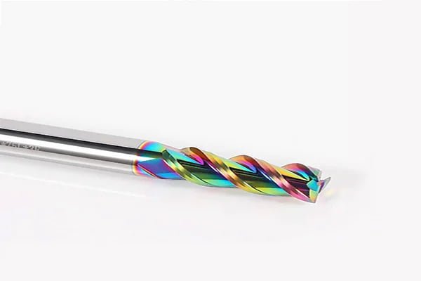 Close-up of a coated solid end mill with a rainbow finish
