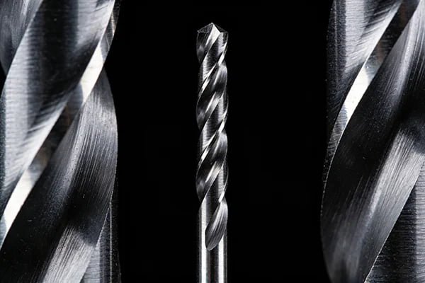Close-up of a tungsten carbide drill bit tip