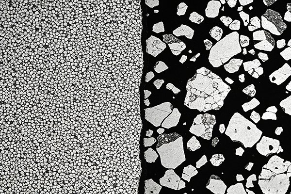 Microscopic image comparing fine grain and coarse grain carbide structures