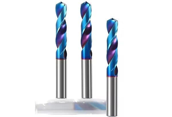 A close-up shot of a coated carbide drill bit, showing its distinct color and texture.