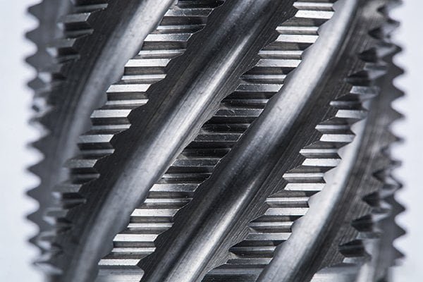 Close-up of a corn cob roughing end mill's serrated edges
