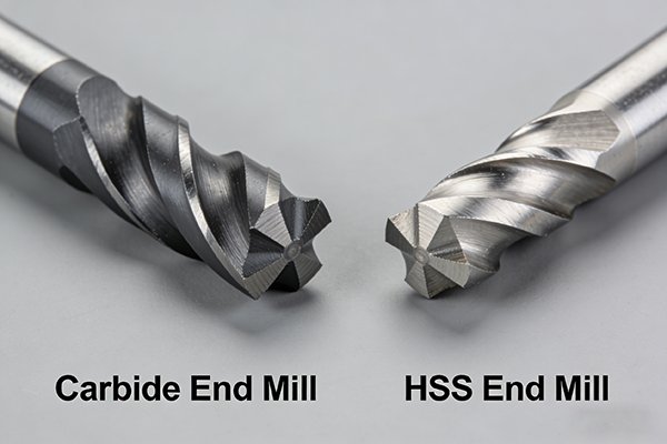 Side-by-side comparison of a carbide end mill and an HSS end mill